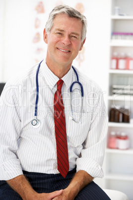 Senior doctor in consulting room
