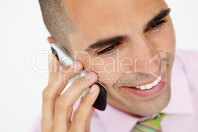 Young businessman using cellphone