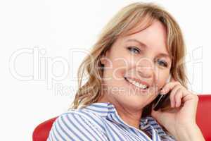 Mid age businesswoman using cellphone