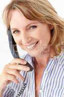 Mid age businesswoman on phone