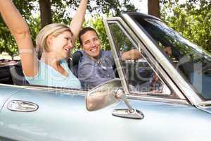 Couple in sports car