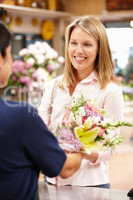 Woman shopping in florist