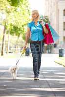 Woman on shopping trip with dog