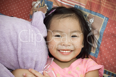 Asian girl with her soft toy