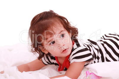baby girl lying on the bed with swimsuit with space for advertis