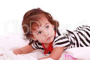 baby girl lying on the bed with swimsuit with space for advertis