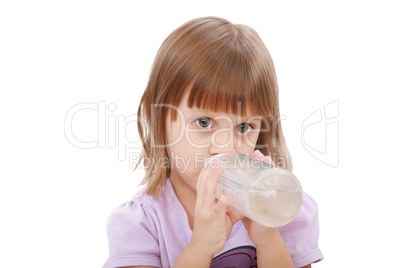 Little girl drinking water of her bottle. White background