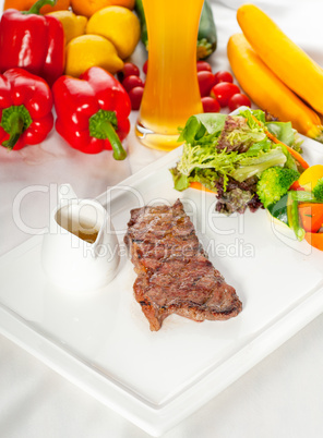 juicy BBQ grilled rib eye ,ribeye steak and vegetables