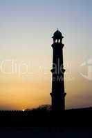 Silhouette of mosque minaret