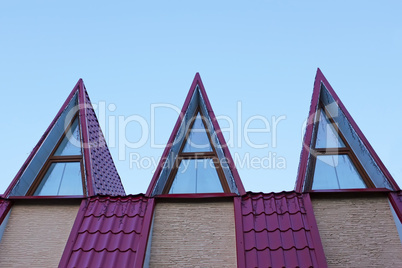 Roof with metal tile