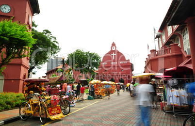 Tourist activity in front Christ Church Malacca.