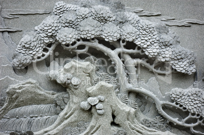 Chinese Feng Shui pine tree carving.