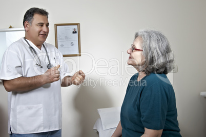 Male doctor talking with his patient