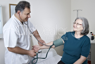 Doctor exam mature patient