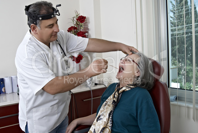 Doctor exam mature patient