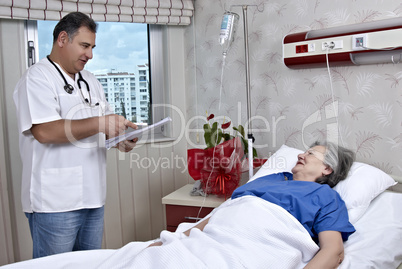 Hospital room doctor and patient