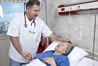 Hospital room doctor and patient