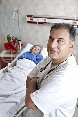 Hospital room doctor and patient