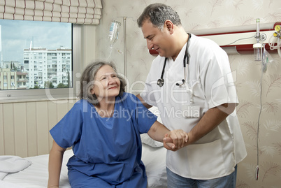 Hospital room doctor and patient