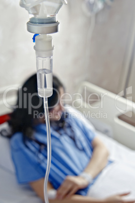 Woman in hospital bed