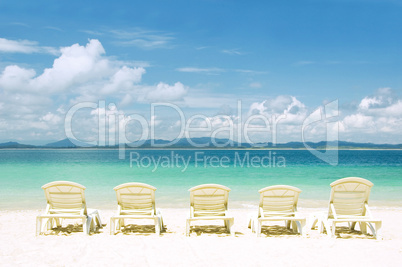 concept photo of beach with chair