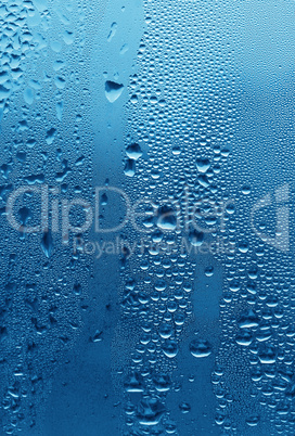 natural water drops on glass