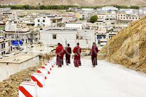few monks walking