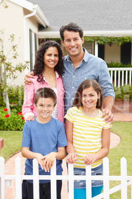 Hispanic family outside home