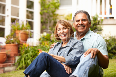 Senior couple relaxing in garden