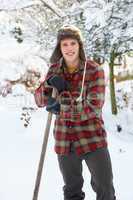 Young man clearing snow