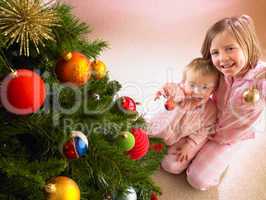 Children with Christmas tree