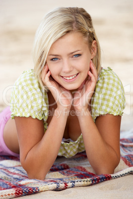Portrait teenage girl on beach