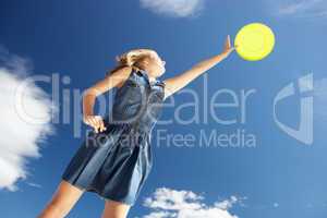 Teenage girl with frisbee
