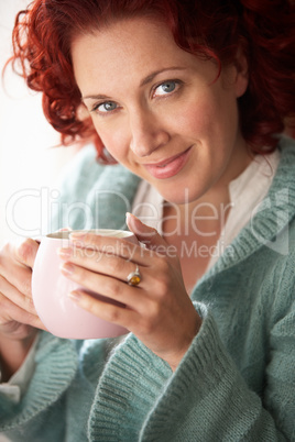 Woman with hot drink