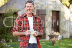 Man in country garden