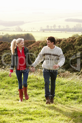 Young couple on country walk