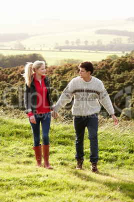 Young couple on country walk