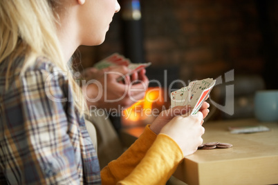 Young people playing cards