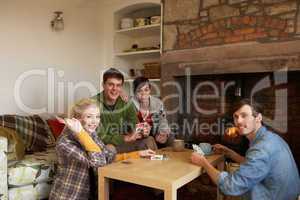 Young couples in cosy cottage