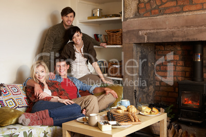 Young couples in cosy cottage