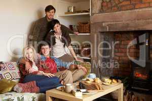 Young couples in cosy cottage