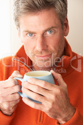 Man with hot drink