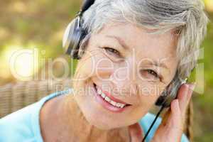 Senior woman with headphone