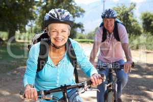 Senior couple on country bike ride