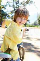 Little boy on country bike ride