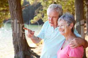 Senior couple at lake together