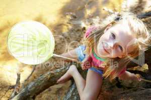 Happy girl fishing at lake