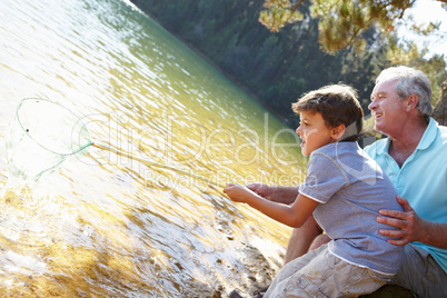 Man and boy fishing together