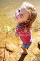 Happy girl fishing