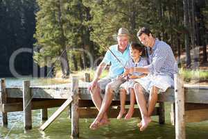 Father,son and grandson fishing together